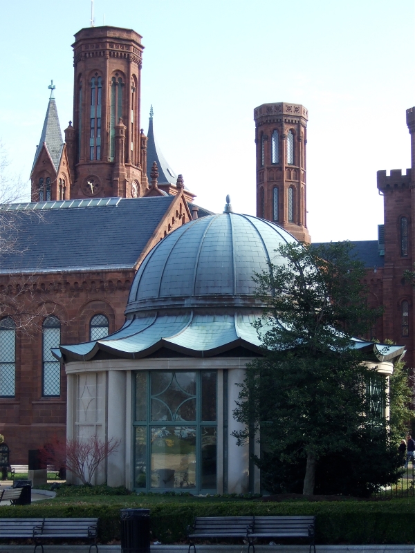 Entrance to the Dillon S. Ripley Center with the Smithsonian Castle in the background.