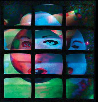 A 4 by 3 grid of rectangular screens with multicolored image of a face from different angles