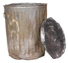 Battered old-school aluminum trash can with battered lid