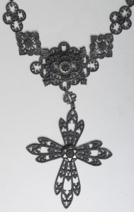 Intricate cast iron openwork pendant and necklace