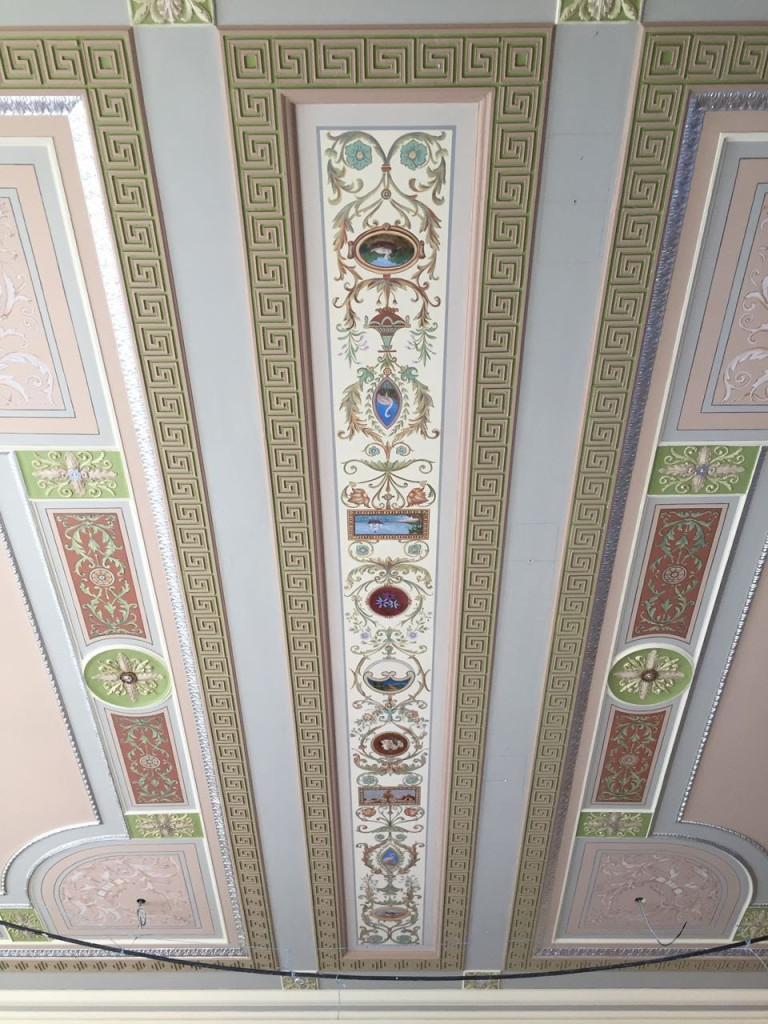 Highly decorated painted and plastered ceiling.