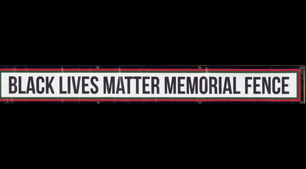 A horizontal banner, on a white background, that reads 'BLACK LIVES MATTER MEMORIAL FENCE' in black lettering. The colors black, red, and green outline the banner.