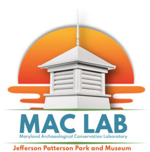 Logo for MAC lab featuring a tower against an orange sunset